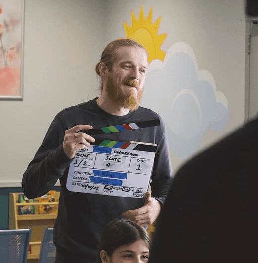 Close-up portrait of a filmmaker on set